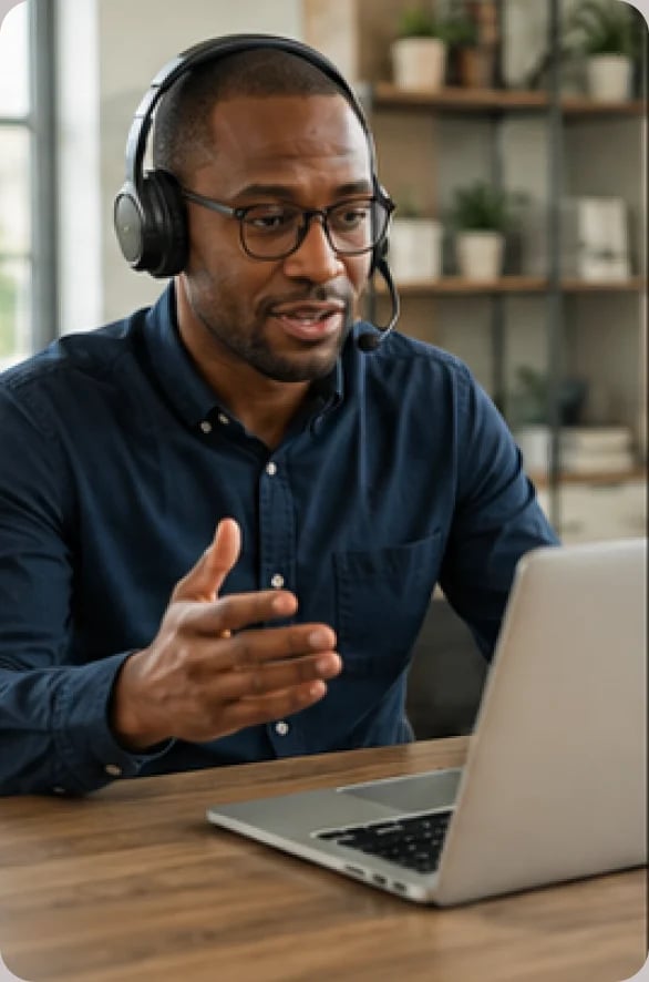Customer success manager wearing a headset during a product training call