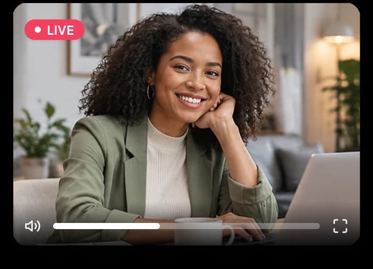Smiling webinar presenter at her laptop, with live video controls